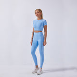 Women fitness active gym seamless botee Yoga Set in light blue, ideal for all seasons, featuring a solid pattern.