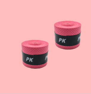 Pink non-slip hand gel for tennis racket grip, ideal for enhancing performance in tennis, squash, and badminton.